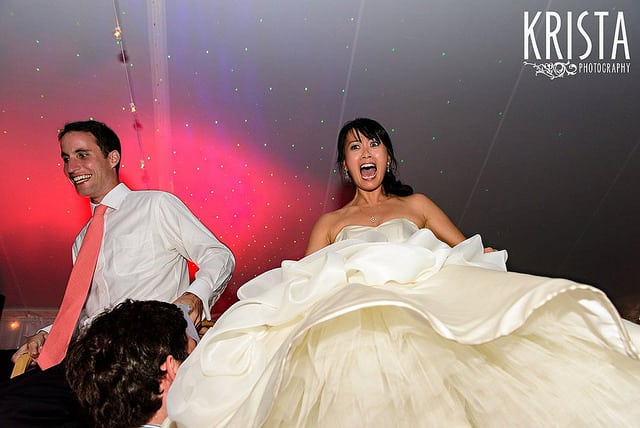 interracial wedding couple dancing at their reception