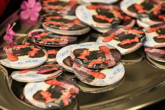  Getting married after 50 wedding guests’ badges with a picture of a new zealand groom and dutch bride
