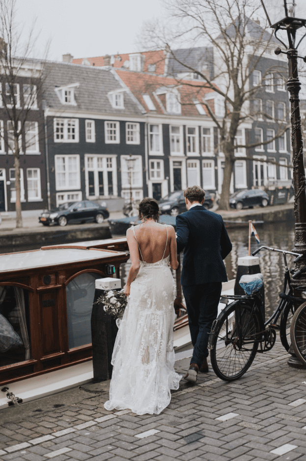 bride and groom aboard a canal boat