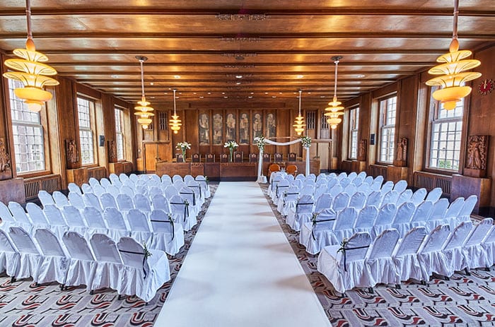 chic weddings holland elegant white chair covers in the sofitel legend grand hotel amsterdam wedding room