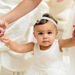 Non-Religious baby Naming Ceremony little girl being held by mum's hand