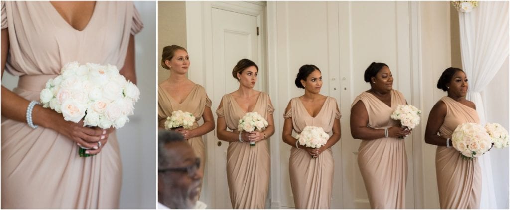 bridesmaids dressed in soft beige dresses holding pink and white bouquets