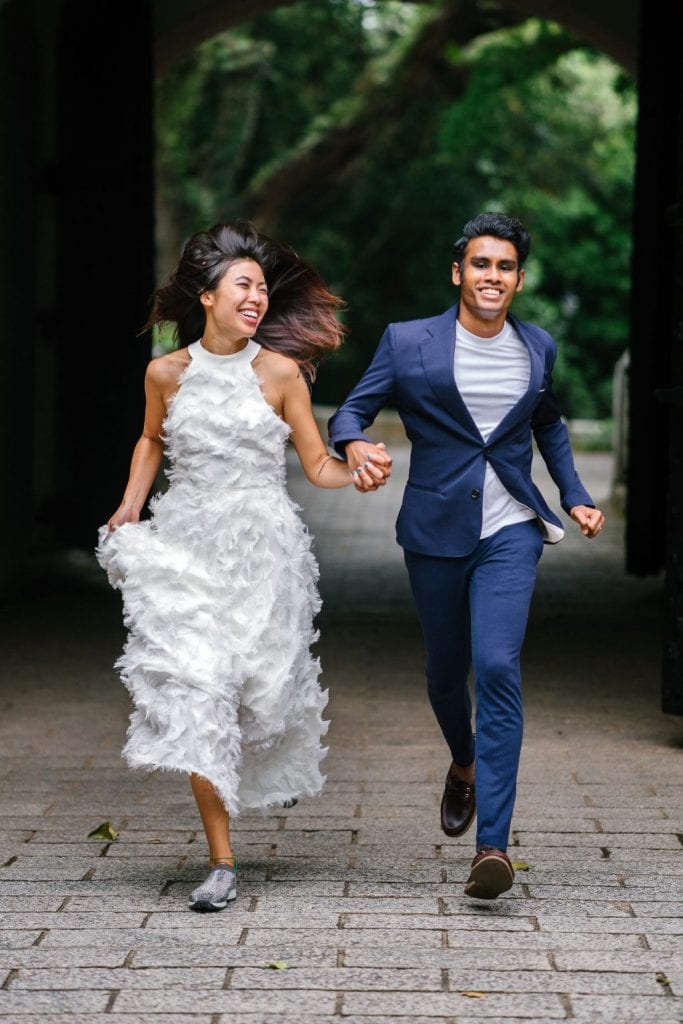 HAPPY wedding gifts budget bride and groom holding hands and running