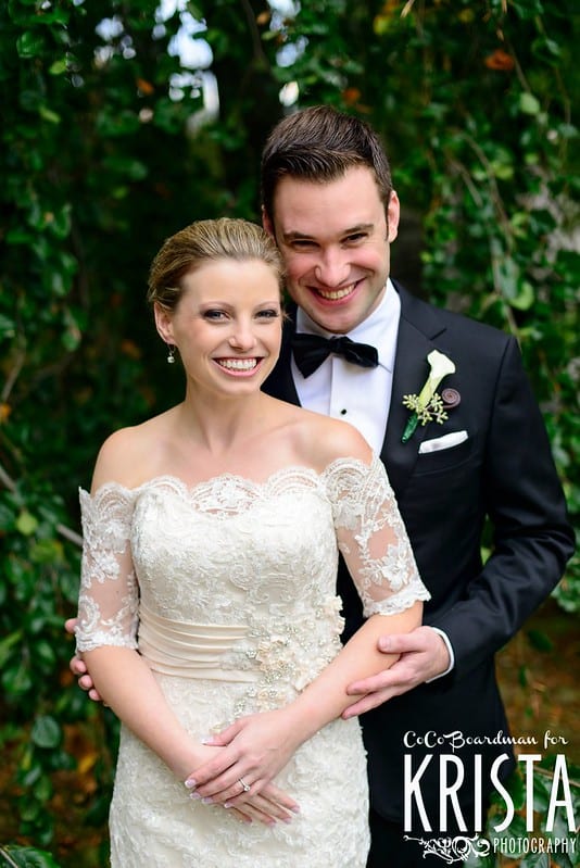 Evening Wedding Ceremony elegantly dressed couple posing and smiling