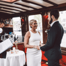 beautiful pictures wedding terms and conditions couple holding hands at boat wedding