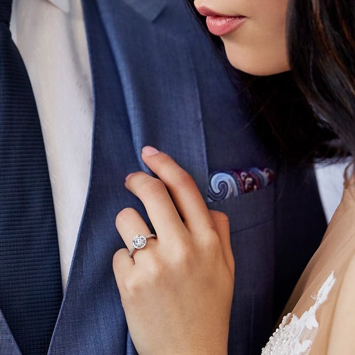 Pre-Wedding Interview Questions flanked solitaire diamond engagement ring in 14kt white gold