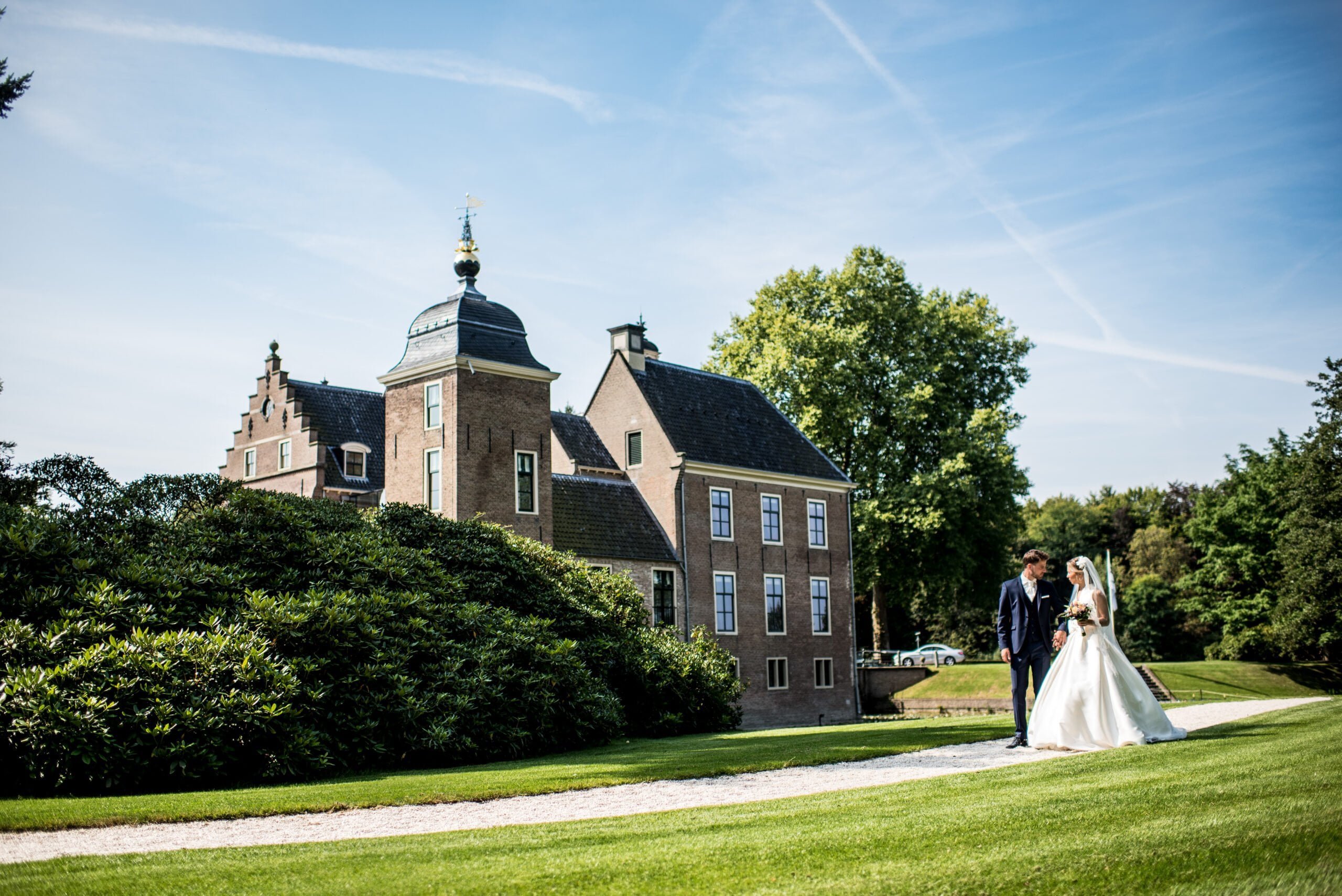 couple walking in castle grounds
