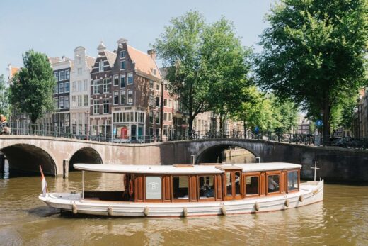 City canal cruise through the Amsterdam Jordaan area near Anne Frank's House on the Prinsengracht.