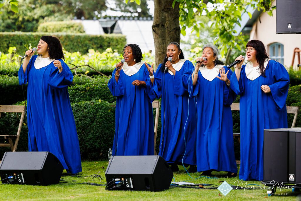 black gospel choir singing and dancing inside the church