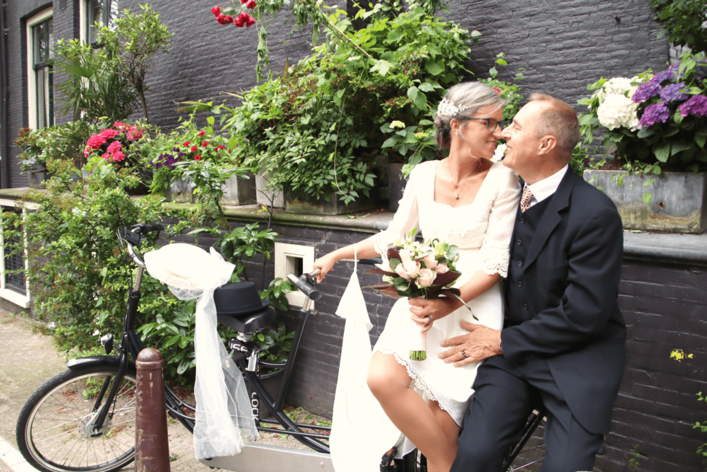 Renewal of Vows Ceremony couple kissing on Amsterdam canal