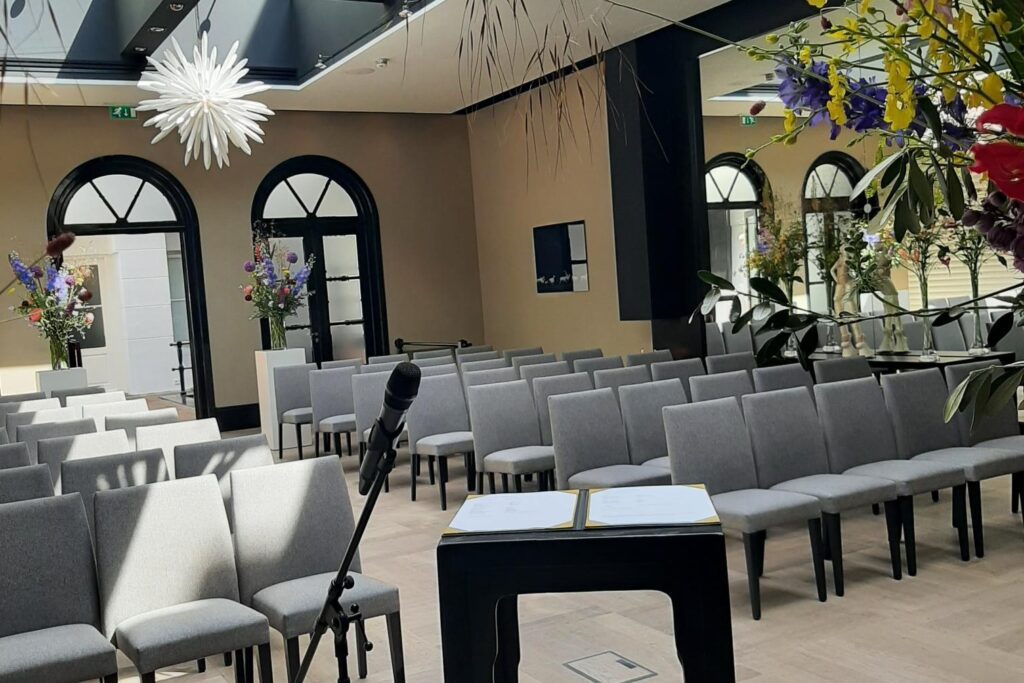 unique wedding ceremony speaker and seating for an officiant's at The Dylan, Amsterdam