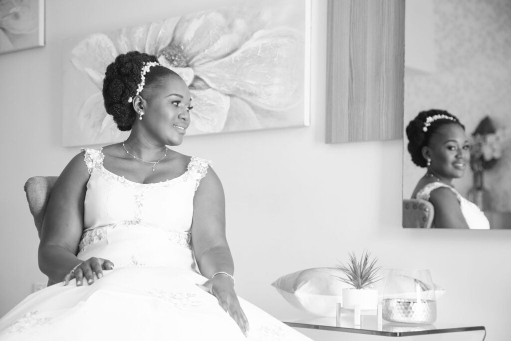 african woman in white bridal outfits