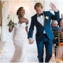wedding love songs playlist with bride and groom dancing down the aisle at the Waldorf Hotel Amsterdam