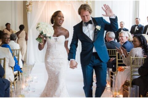 wedding love songs playlist with bride and groom dancing down the aisle at the Waldorf Hotel Amsterdam