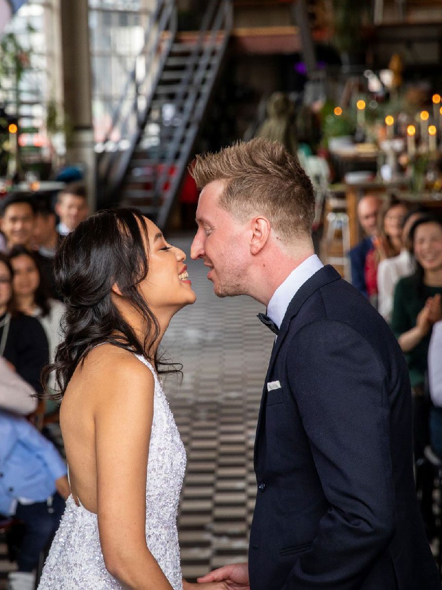A couple kissing at a short and sweet wedding speech at a ceremony at The Ketelhuis, S-Strijp in Eindhoven.