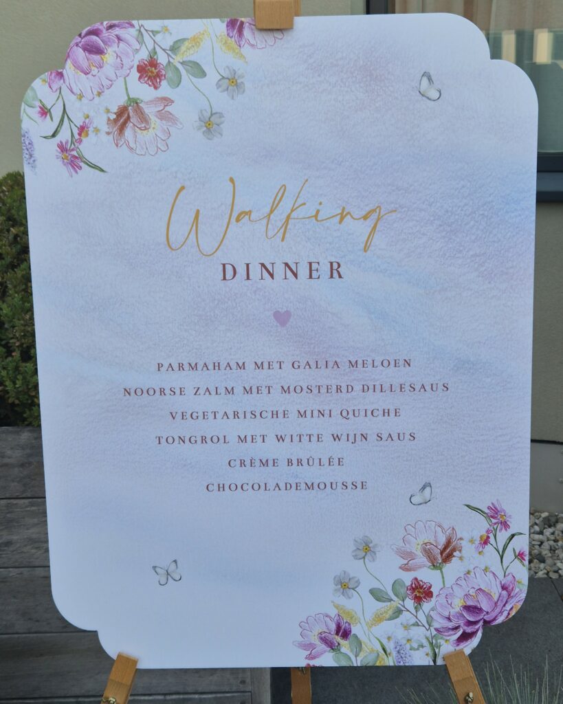 A floral coloured walking dinner menu for a special wedding boat arrangement.