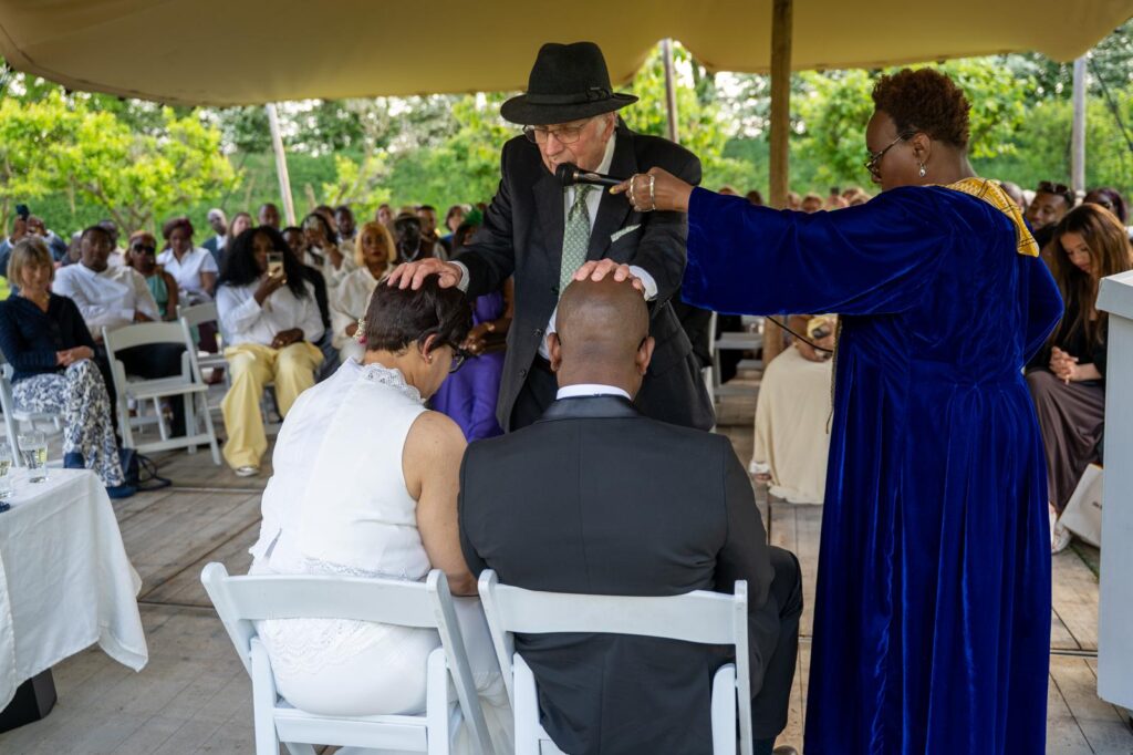 Symbolic weddings in the Netherlands, couple being blessed by the father of the bride.
